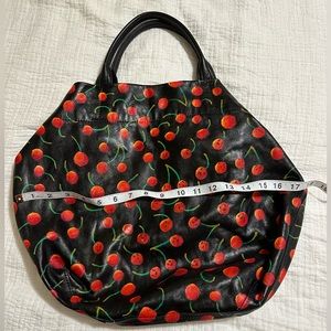 Rough & Tumble red and black purse.